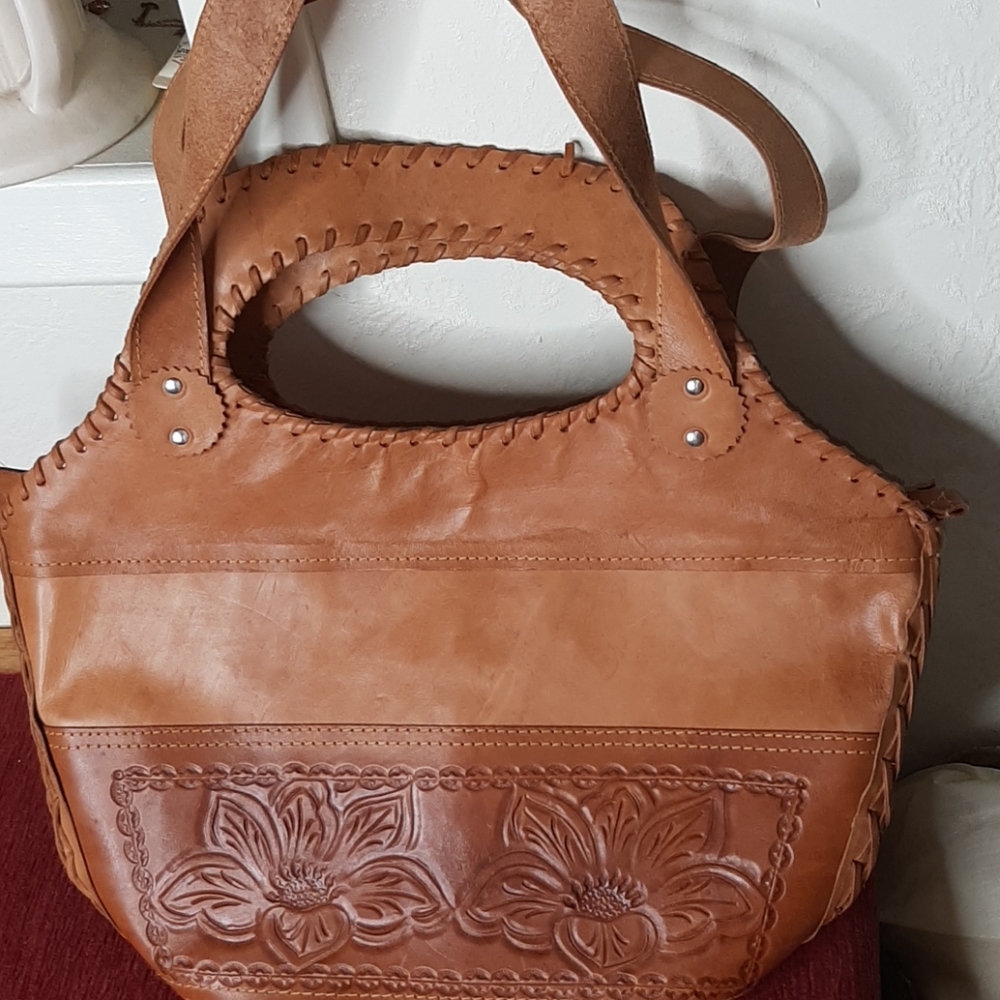 Leather hand tooled shoulder or hand bag